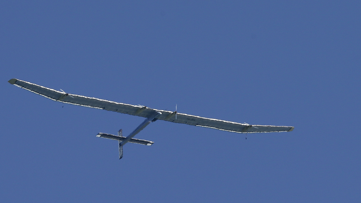  The Solar Impulse, piloted by Bertrand Piccard, flies over San Francisco Bay in April 2013. (AP Photo/Jeff Chiu) 
