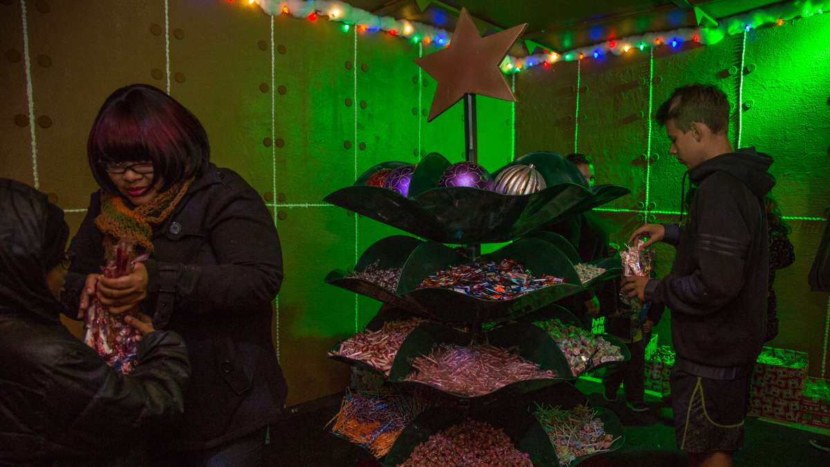 Inside Ben's Sweets and Treats kids can make their own candy bag inside the gingerbread house.