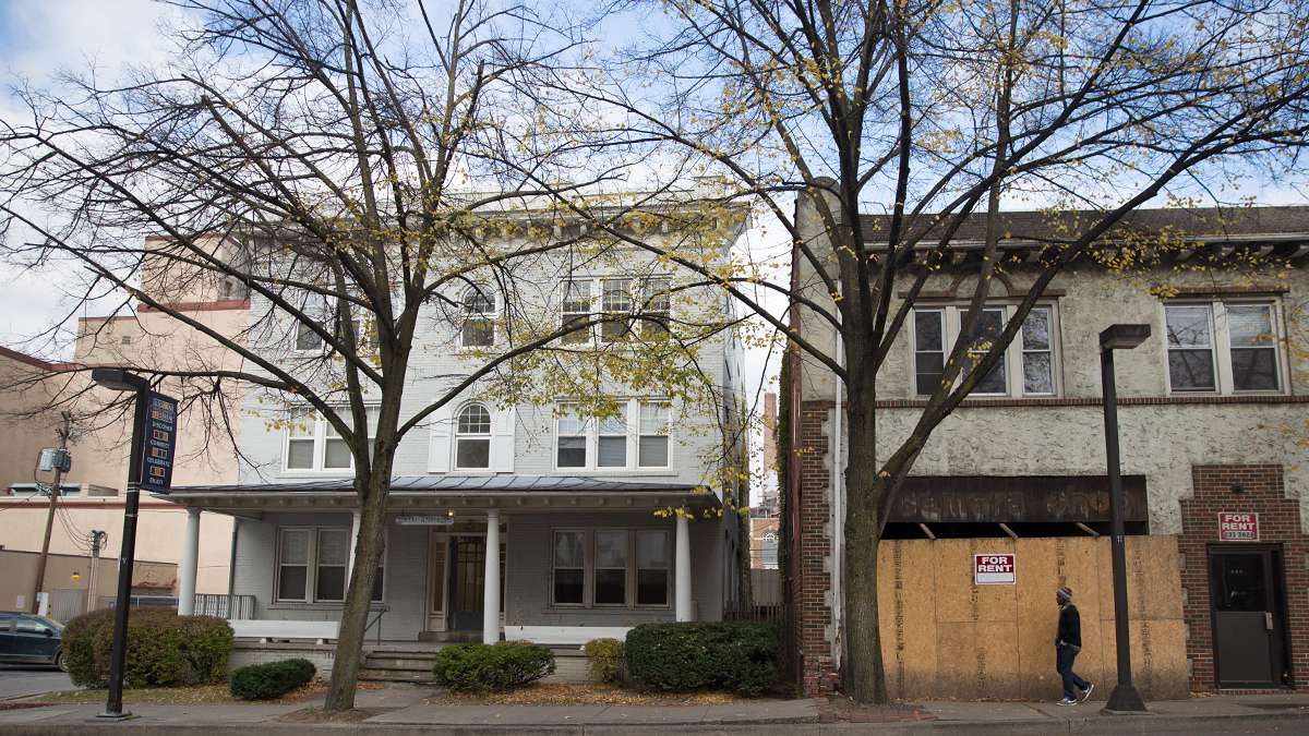 Today, the Nor-Lea apartments (left) and a former camera shop are on West Beaver Avenue at the same location. (Lindsay Lazarski/WHYY)