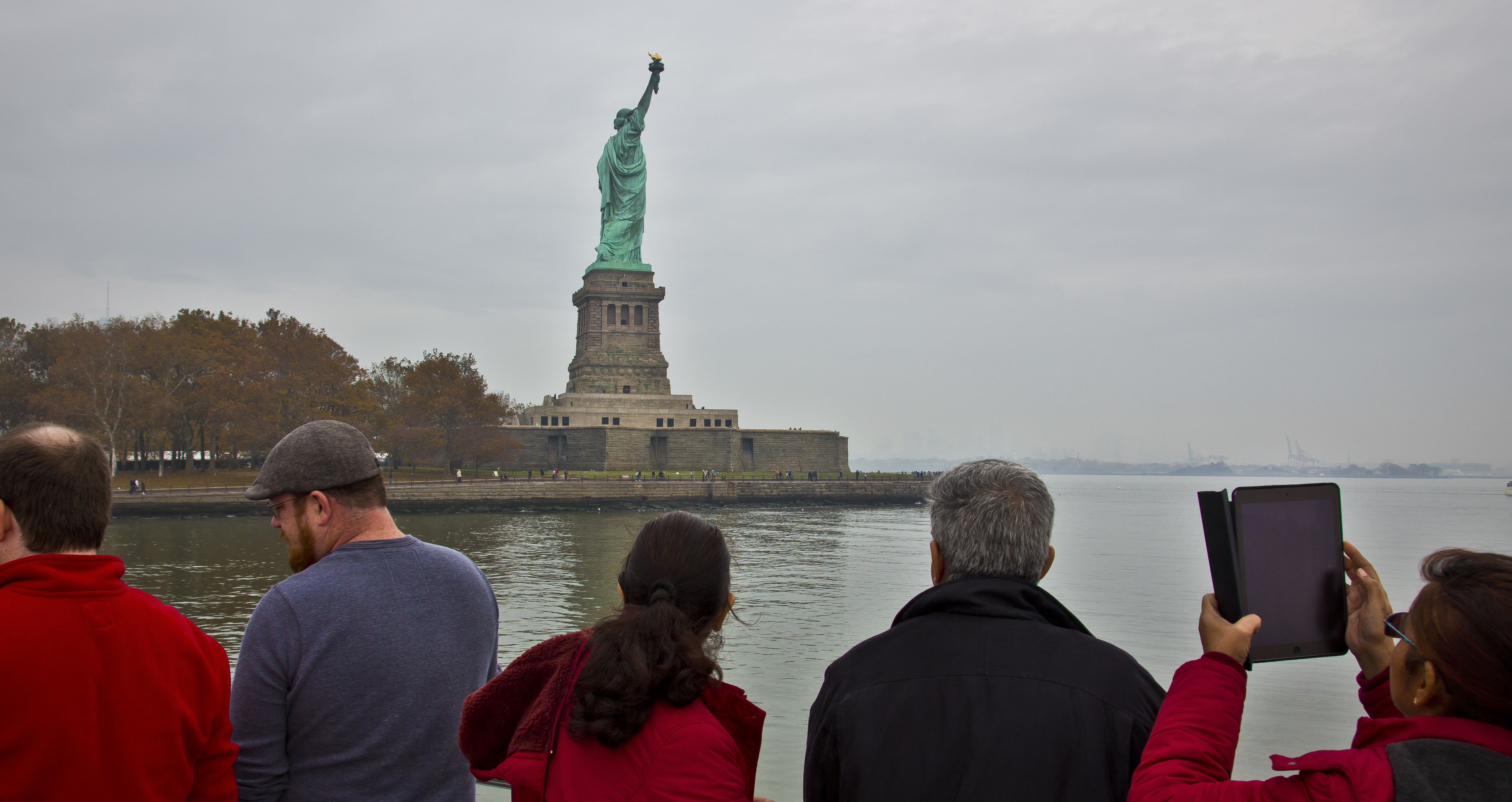  Visitors view the Statue of Liberty during a ferry ride to Liberty Island in New York. (AP Photo/Bebeto Matthews, File) 