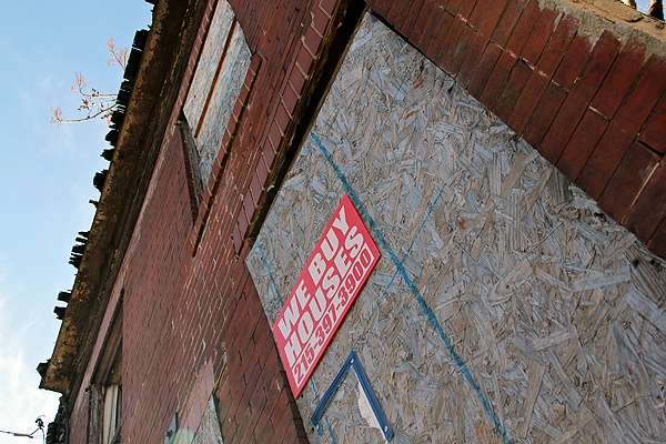 <p>This crumbling home at 1428 S. Colorado street is one of 22 investigators say were stolen by men who forged the deeds. (Emma Lee/for NewsWorks)</p>
