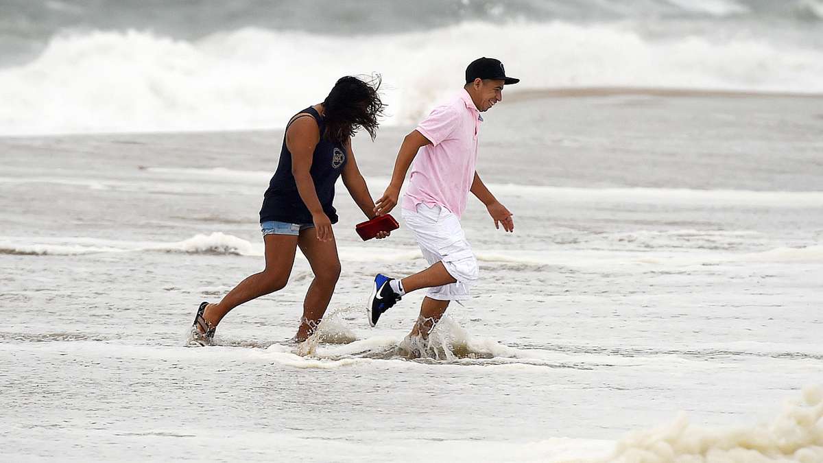 Tropical Storm Hermine passed by the Delaware Coast over Labor Day Weekend bringing wind, rain and high surf with dangerous rip currents, which had the beach totally closed on Saturday after Lifeguards went on duty. Sunday brought a sunny and windy day with rough surf, however the beach was open but the water red flagged for swimming. Beach Erosion occurred as the pounding surf continues to roll up the beach during high tide. Crowds were noticeably down as the storm churned up and out to sea. (Chuck Snyder for NewsWorks)