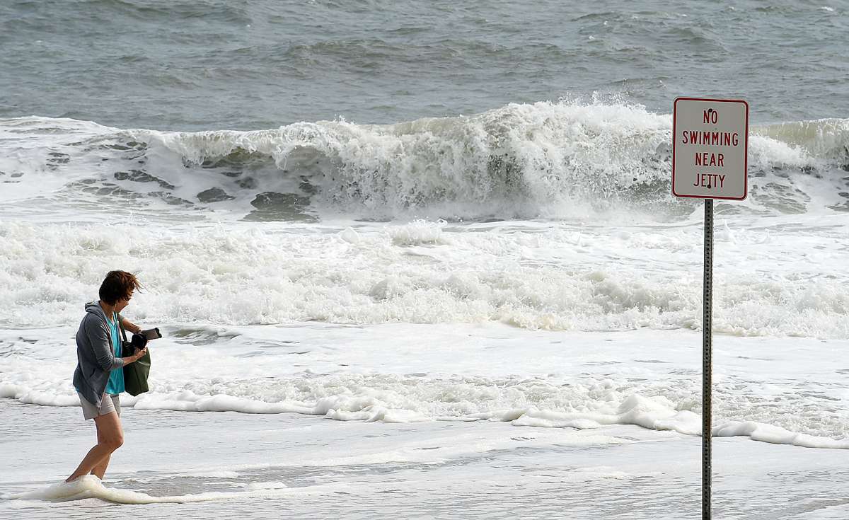 Tropical Storm Hermine passed by the Delaware Coast over Labor Day Weekend bringing wind, rain and high surf with dangerous rip currents, which had the beach totally closed on Saturday after Lifeguards went on duty. Sunday brought a sunny and windy day with rough surf, however the beach was open but the water red flagged for swimming. Beach Erosion occurred as the pounding surf continues to roll up the beach during high tide. Crowds were noticeably down as the storm churned up and out to sea. (Chuck Snyder for NewsWorks)