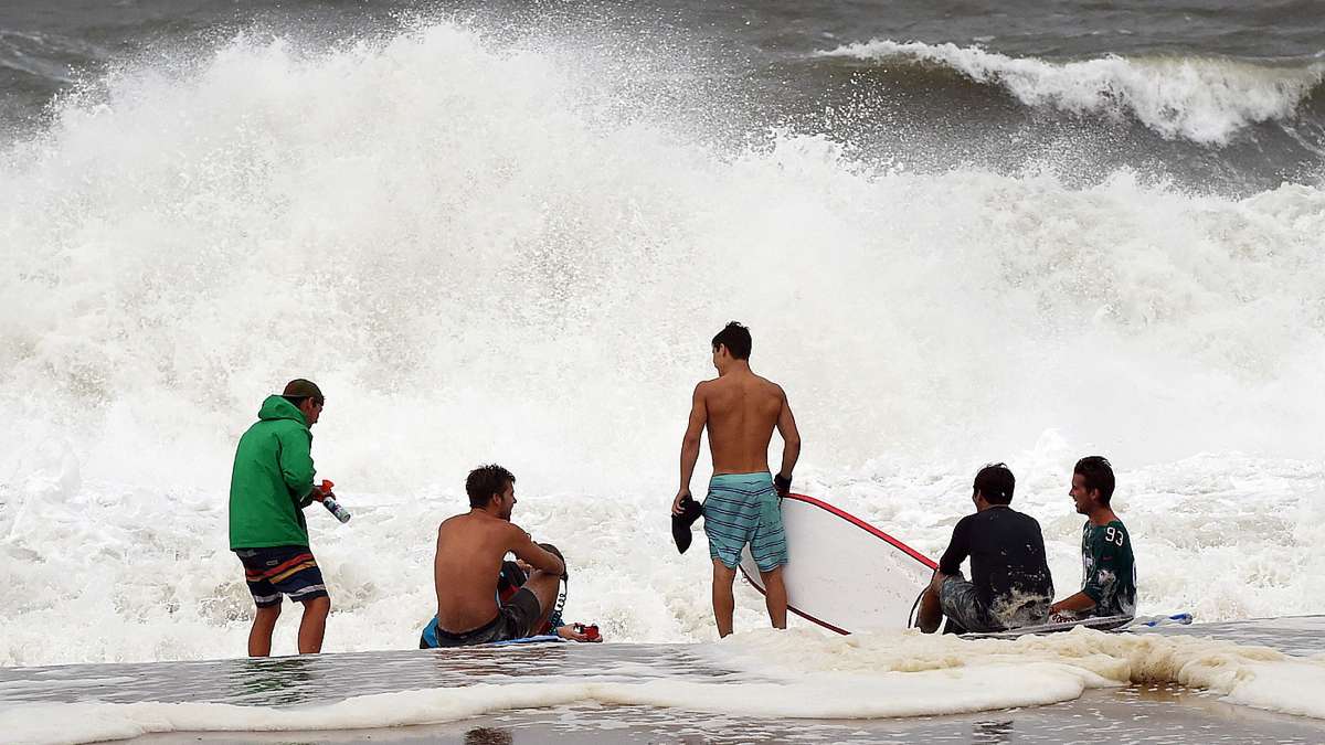 Tropical Storm Hermine passed by the Delaware Coast over Labor Day Weekend bringing wind, rain and high surf with dangerous rip currents, which had the beach totally closed on Saturday after Lifeguards went on duty. Sunday brought a sunny and windy day with rough surf, however the beach was open but the water red flagged for swimming. Beach Erosion occurred as the pounding surf continues to roll up the beach during high tide. Crowds were noticeably down as the storm churned up and out to sea. (Chuck Snyder for NewsWorks)