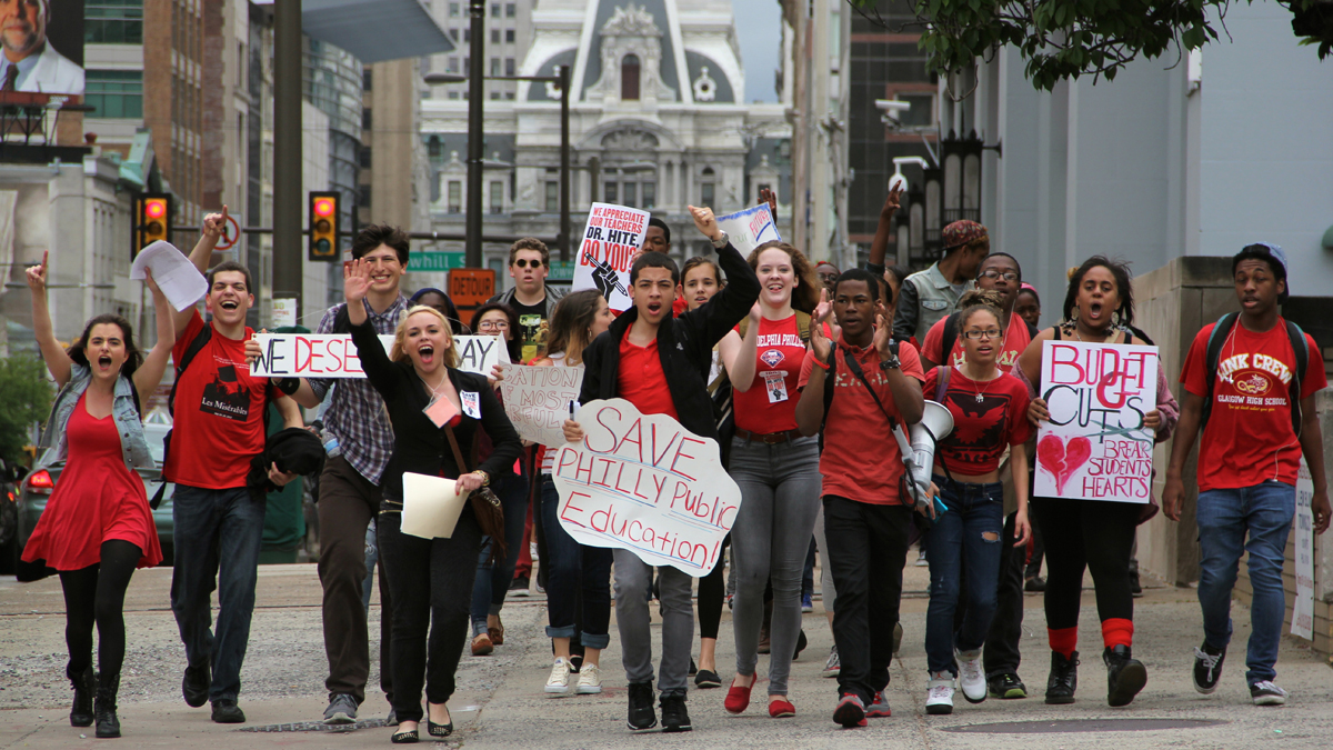  Philadelphia public high school students march down Broad Street from City Hall to school district headquarters during a May 7 budget-cuts protest. (Emma Lee/for NewsWorks) 