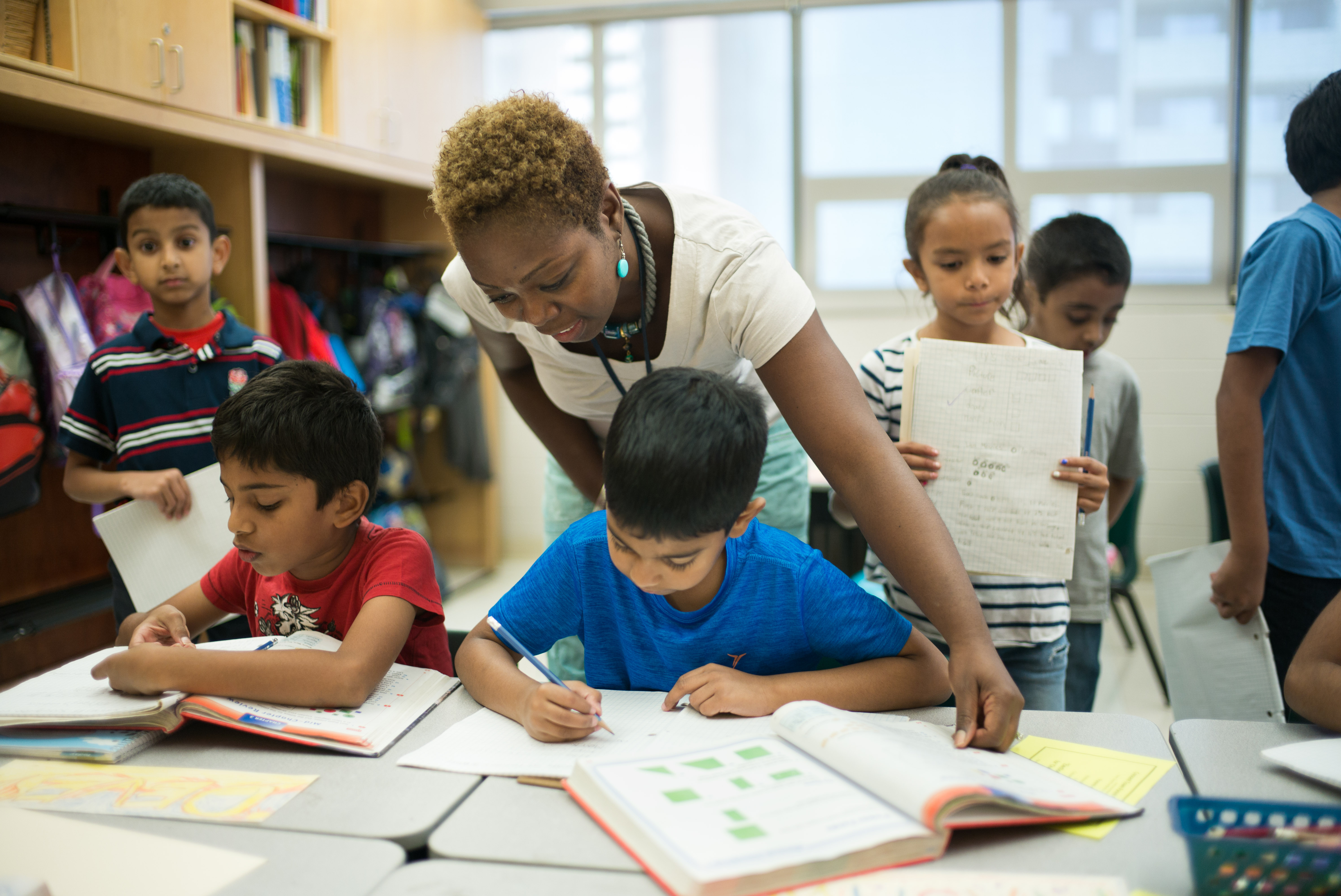 Laura Lloyd, a third grade teacher, with her class at Crescent Town Elementary School in Toronto, Ontario, Canada. (Ian Willms/For Keystone Crossroads)