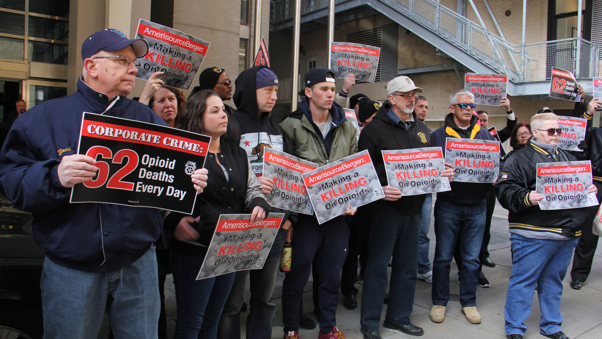  Teamsters concerned about opioid addiction rally outside the Sofitel Hotel in Center City where pharmaceutical company AmerisourceBergen was having its annual shareholders meeting. (Emma Lee/WHYY) 