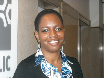 Tammi Fleming is leading Philadelphia's Plain Talk program to curb unwanted teen pregnancy. During the program, one neighbor invites other parents to join a series of kitchen-table discussions about sexual health and contraception.