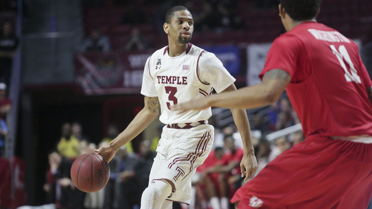 Temple's Jesse Morgan dribbles against Houston's JC Washington Thursday, February 23, 2015 at the Liacouras Center. Temple won 66-54. Morgan finished with 10 points in 25 minutes of play. Kevin Cook / for NewsWorks.