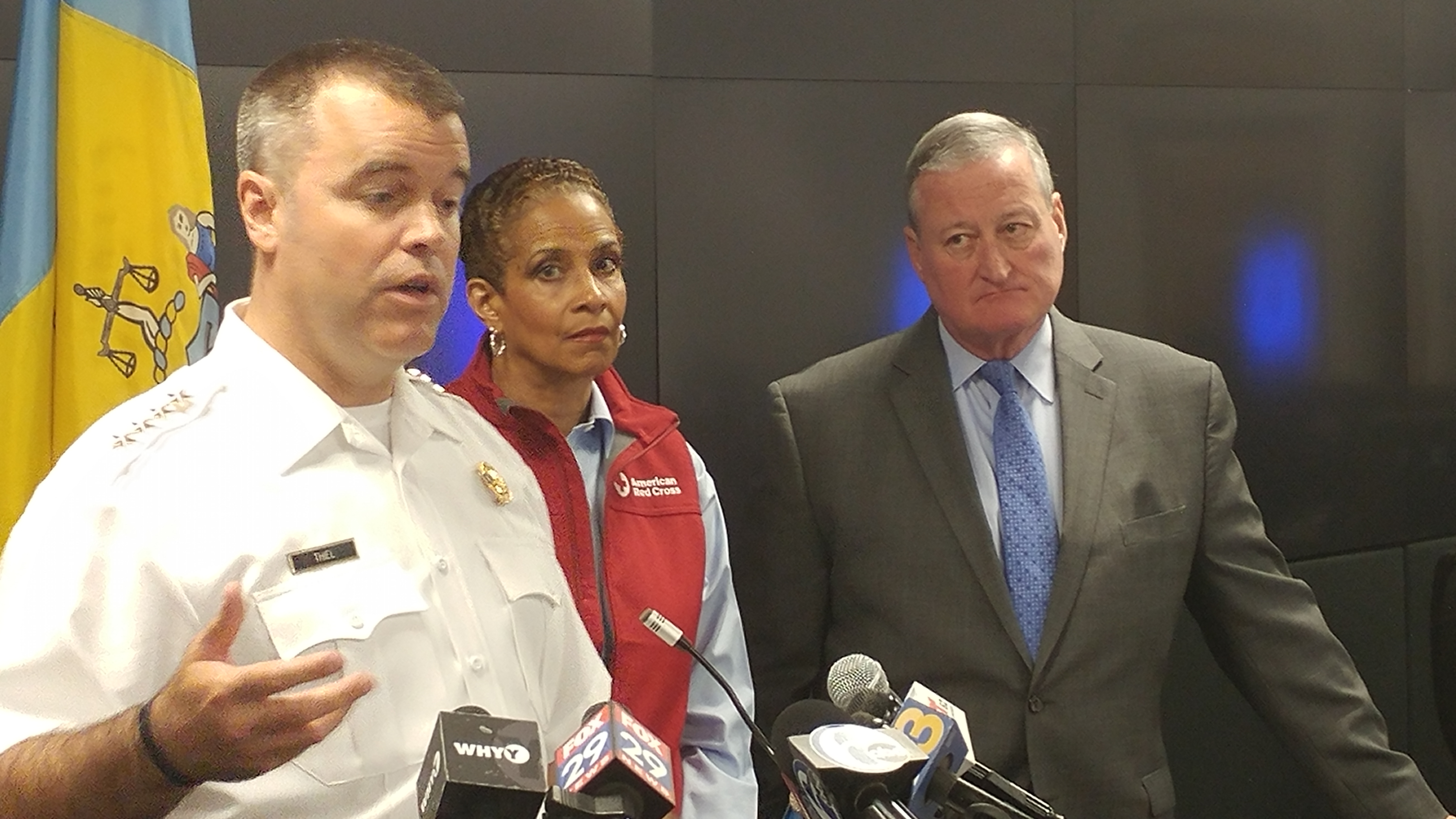  Philadelphia Fire Commissioner Adam Thiel, (from left), Renee Cardwell Hughes, CEO of the American Red Cross Eastern Pennsylvania, and Mayor Jim Kenney urge residents to have smoke detectors in place. (Tom MacDonald/WHYY) 