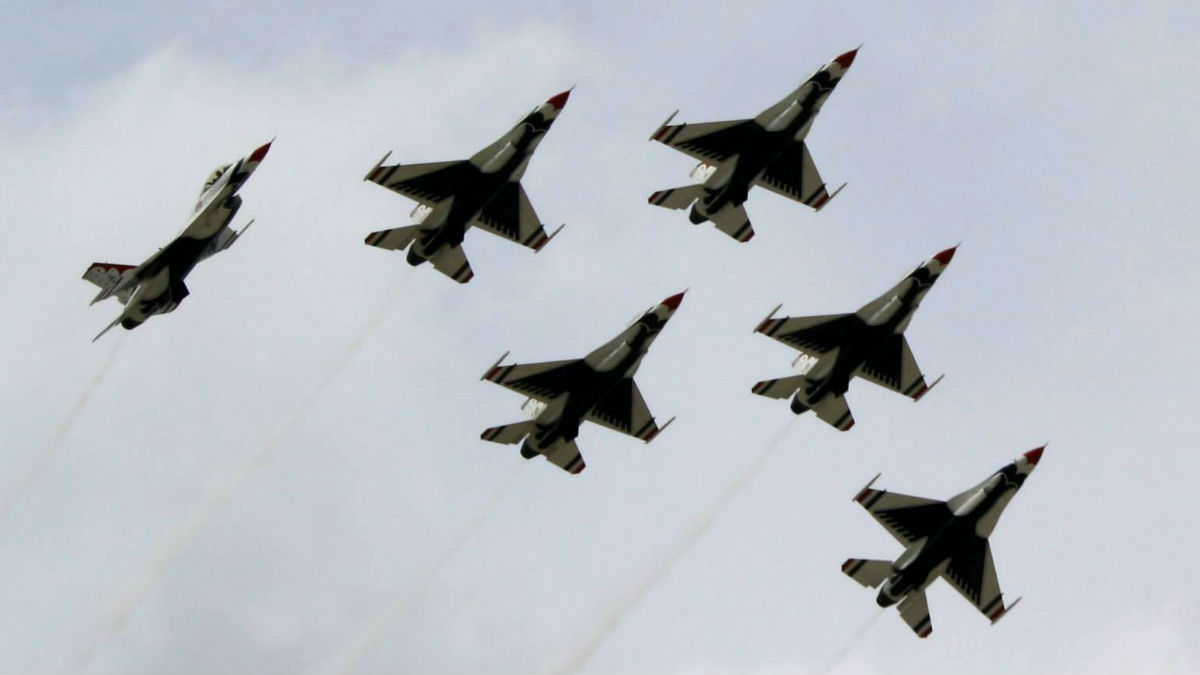 The U.S. Air Force Thunderbirds perform during an air show at Joint Base McGuire Dix Lakehurst in New Jersey. (Mark Eichmann/WHYY)
