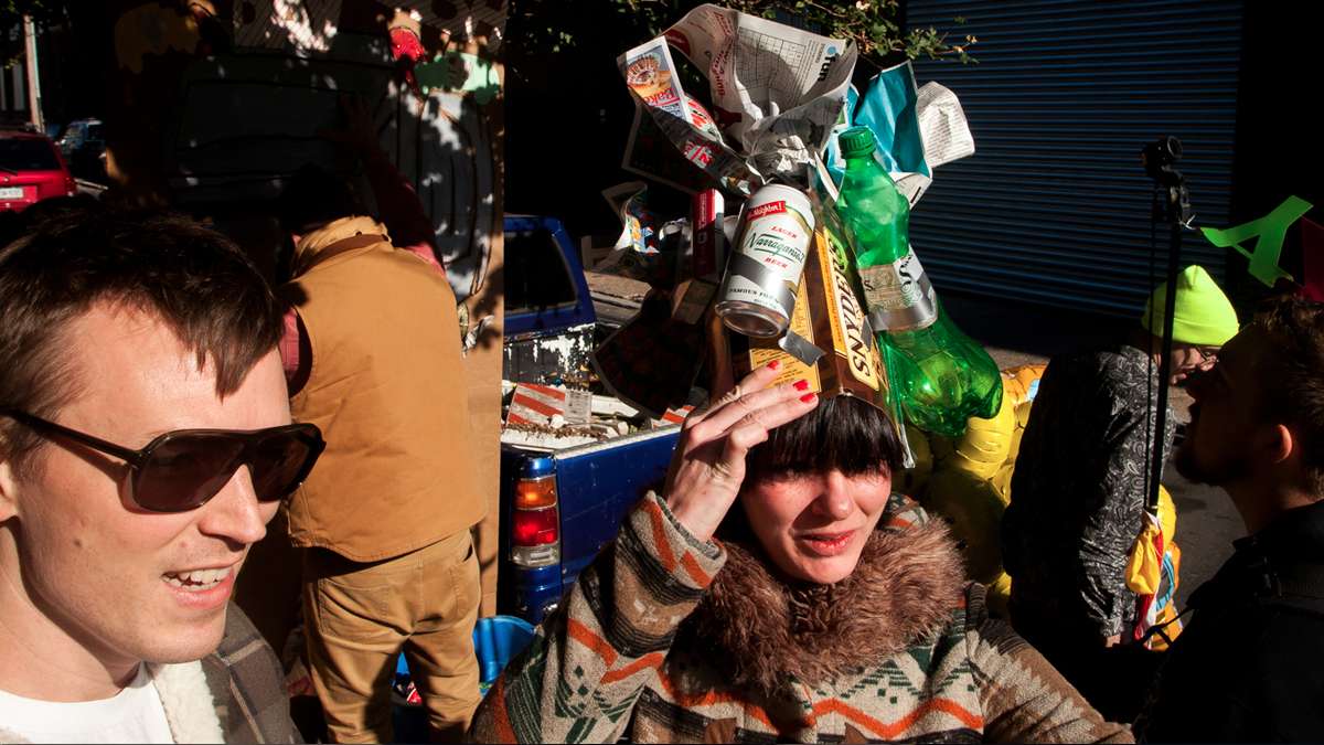 Allison Sexton and Chris McDonnell wait for the trash collectors to arrive. (Brad Larrison/for NewsWorks)