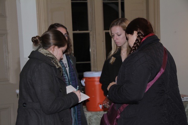 <p><p>LaSalle University students talk with Aine Doley (right), Germantown Tree Tender head, about collaborative planting projects. (Trenae V. McDuffie/for NewsWorks)</p></p>
