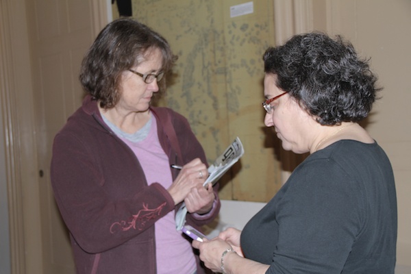 <p><p>Julie Slavet, executive director of Tookany/Tacony-Frankford Watershed Partnership, Inc. (right), speaks with a "Branch Out" event attendee. (Trenae V. McDuffie/for NewsWorks)</p></p>
