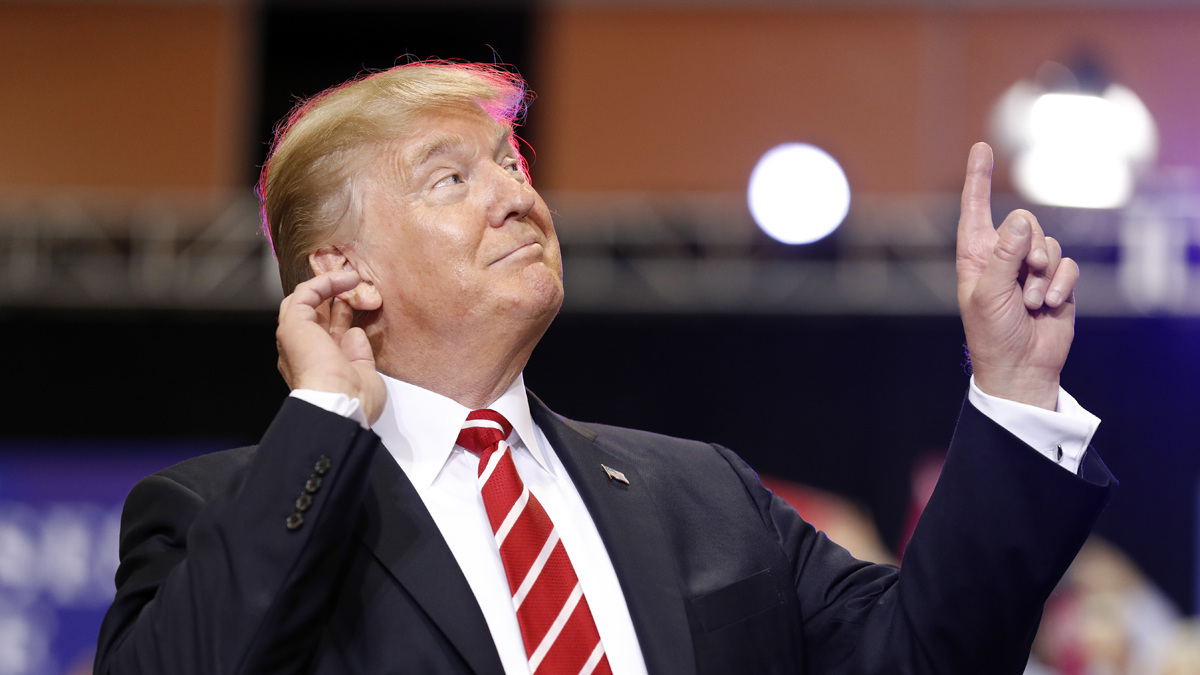  President Donald Trump reacts to the song as he arrives at a rally at the Phoenix Convention Center, Tuesday, Aug. 22, 2017, in Phoenix. (AP Photo/Alex Brandon) 