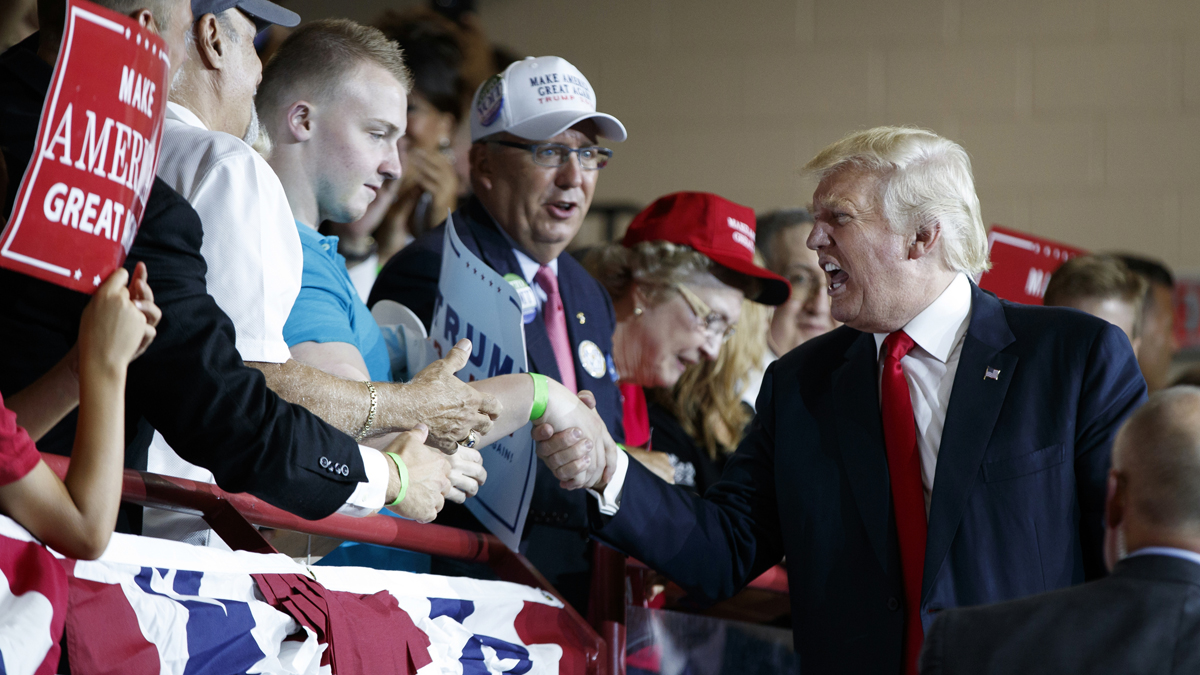  Republican presidential candidate Donald Trump shakes hands during a campaign rally at Cumberland Valley High School, Monday, Aug. 1, 2016, in Mechanicsburg, Pa. (AP Photo/Evan Vucci) 