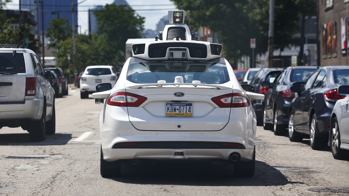A self-driving Ford Fusion hybrid car is test driven