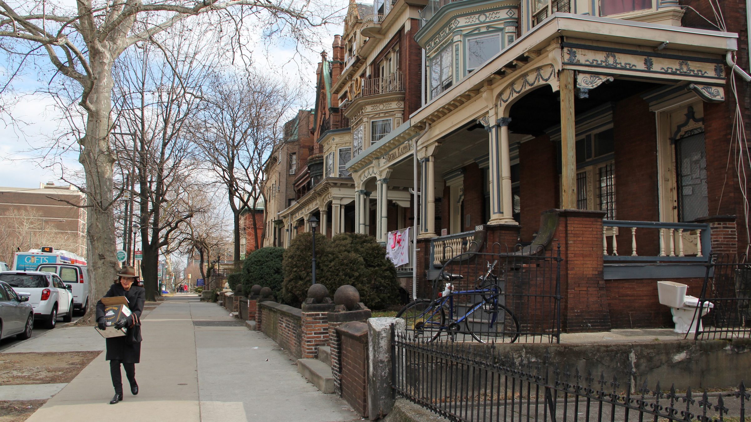 Homes like these on Spruce Street in University City have seen a rapid increase in rents and property taxes. (WHYY, file) 