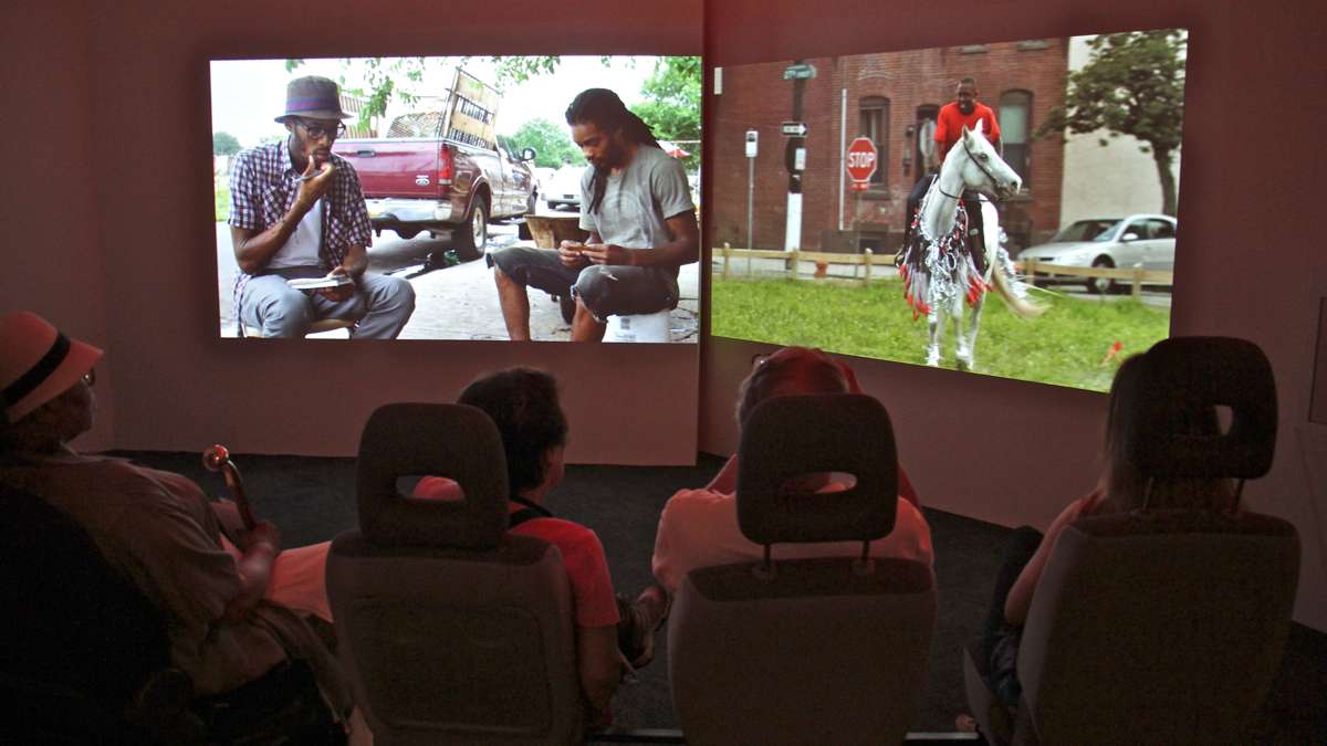 A 13-minute film, ''Horse Day,'' plays on two screens. Viewers sit in car seats.