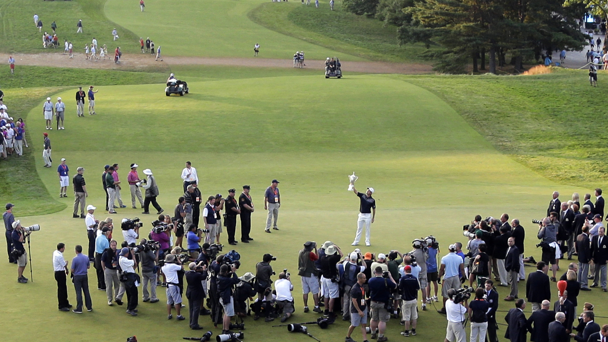 Justin Rose poses with the trophy after winning the U.S. Open golf tournament at Merion Golf Club