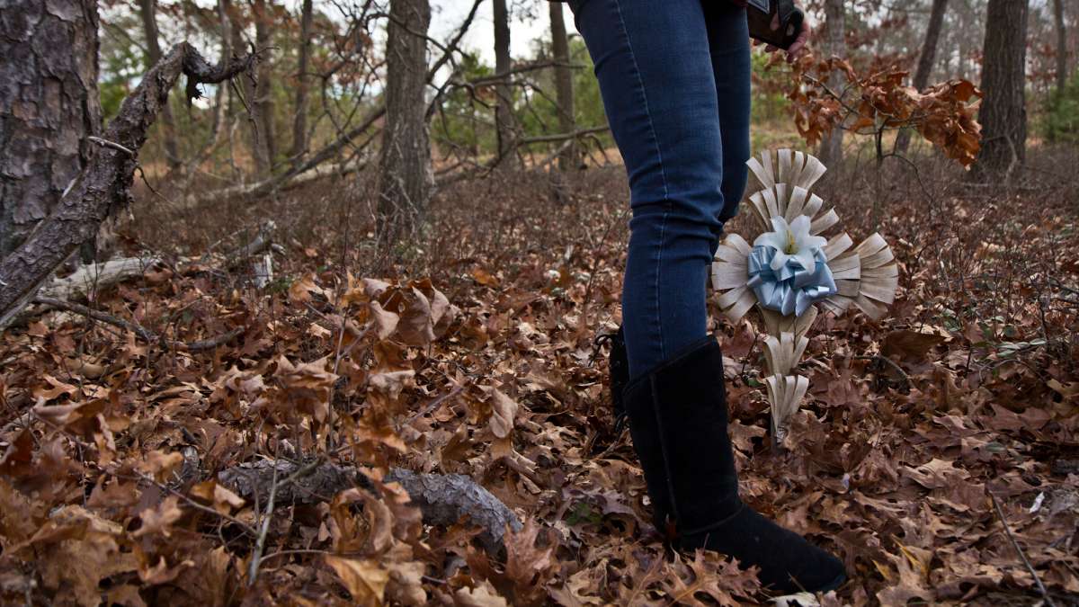 A cross marks the spot where Dianne Valiante found the shoes and headband of her daughter Tiffany.