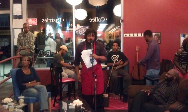 <p><p>Spoken-word artist Delantz performs a piece about domestic abuse. (Yasmein James/for NewsWorks)</p></p>
