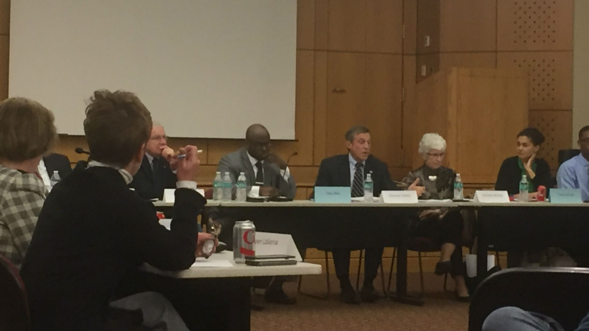  Members of the Wilmington Education Improvement Commission meet with Delaware Gov. John Carney in Wilmington Tuesday night. (Zoe Read/WHYY) 