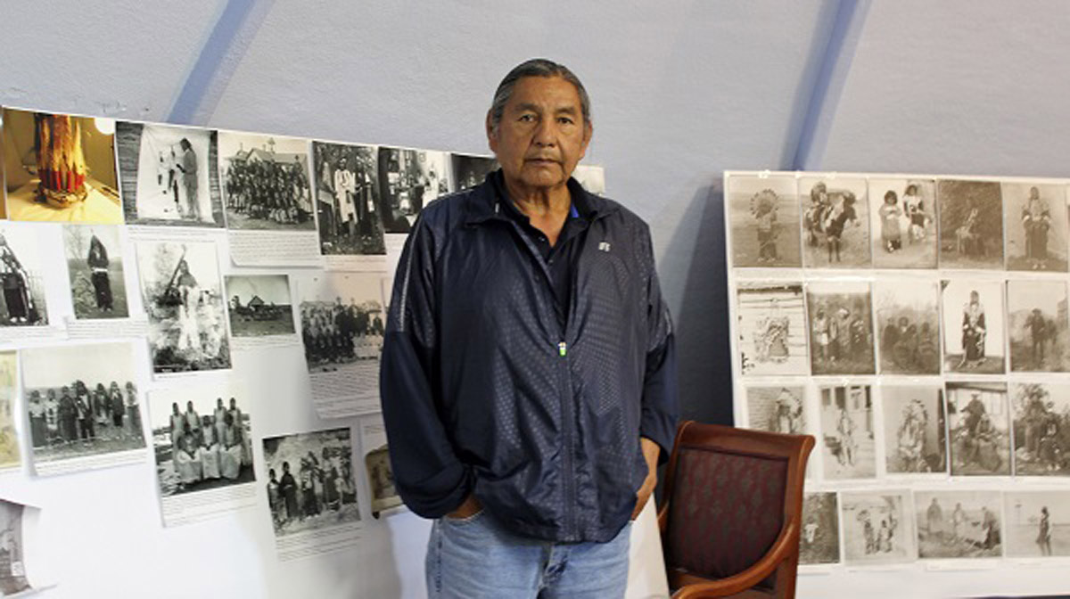  Russell Eagle Bear, the historic preservation officer for the Rosebud Sioux Tribe, looks at photos and maps in his office in Rosebud, S.D., of the Carlisle Indian Industrial School in Pennsylvania. Eagle Bear led a meeting last year between leaders of several tribes, including the Rosebud Sioux Tribe, and representatives from the U.S. Army to address the possibility of repatriating the remains of at least 10 Native American children who died away from their homes while being forced to attend the school more than a century ago. (Regina Garcia Cano/AP Photo) 