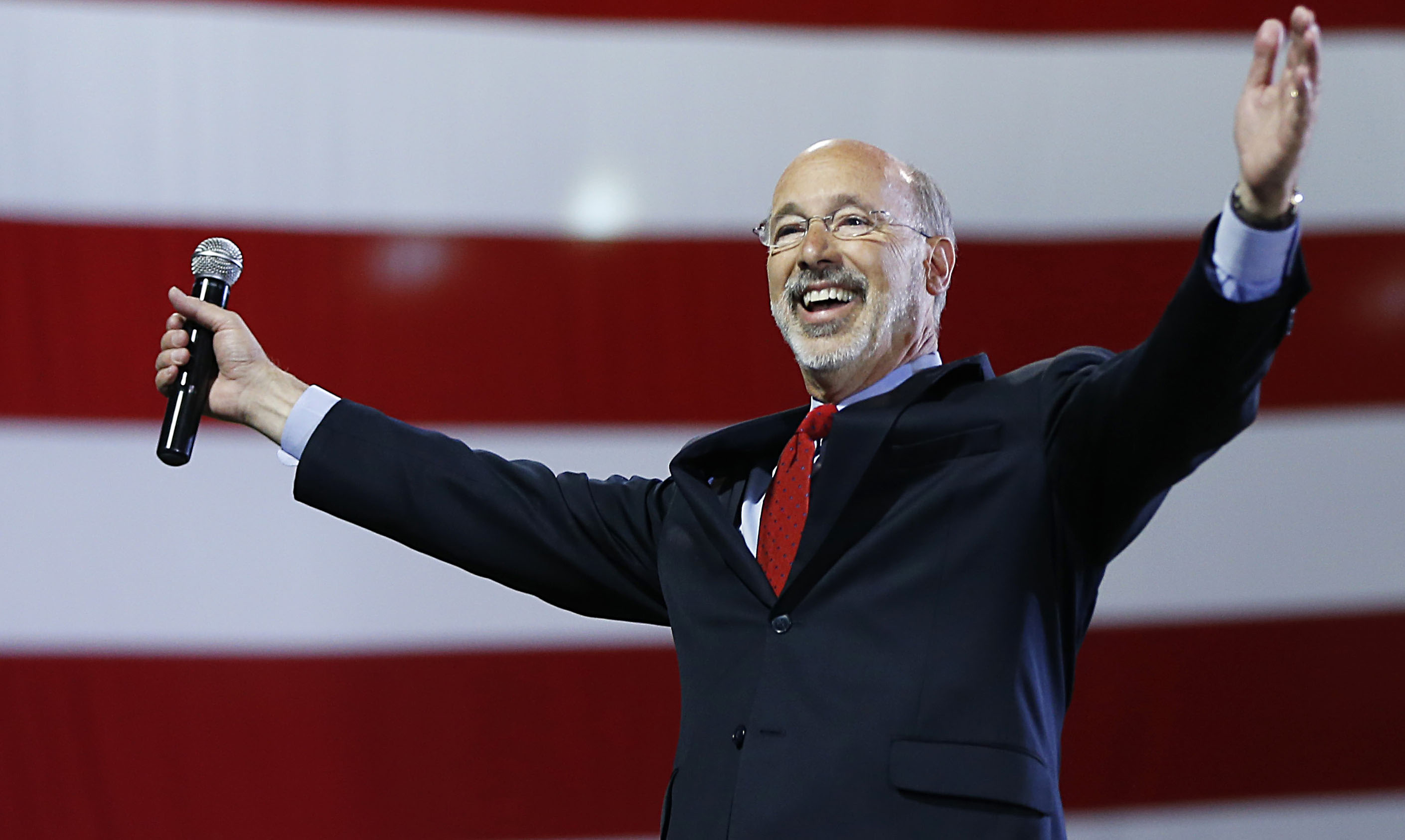  Democratic gubernatorial nominee Tom Wolf celebrates his victory Tuesday. (Matt Rourke/AP Photo) 