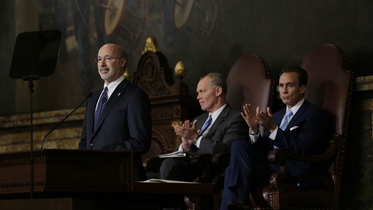  Gov. Tom Wolf, left, delivers his budget address for the 2015-16 fiscal year to a joint session of the Pennsylvania House and Senate on Tuesday, March 3, 2015, in Harrisburg, Pa. Speaker of the House of Representatives, Rep. Mike Turzai, R-Allegheny, is at center, and Lt. Gov. Michael Stack, is at right. (AP Photo/Matt Rourke) 