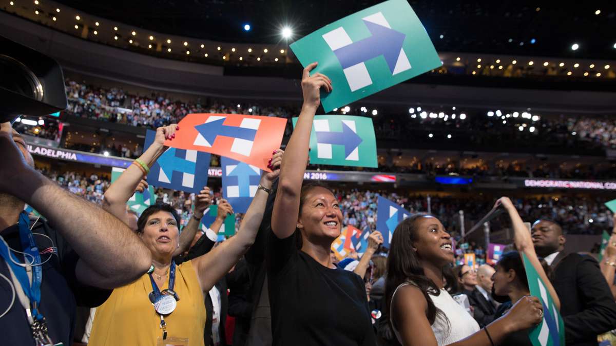 ''This is a proud moment in history for women and for the future of our country,'' said Kim Bowman (center) with Nd Ubezonu (right), staffers for Florida Congresswoman Frederica Wilson.