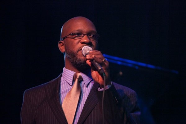 <p>Philadelphia's Orrin Evans introduciong members of his Captain Black Big Band. (Howard Pitkow/for Newsworks)</p>
