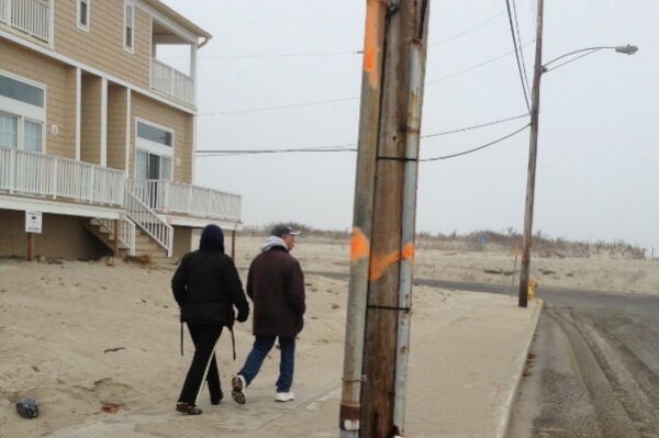 <p><p><span style="font-family: monospace; font-size: 13.714285850524902px;">Across the street from Poverty Beach. The spray paint indicates the height of sand after Sandy. (Jen A. Miller/for NewsWorks)</span></p></p>

