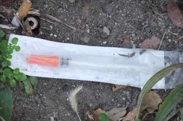 <p><p>Syringe on the grounds of the building. (Tara Nurin/for NewsWorks)</p></p>

