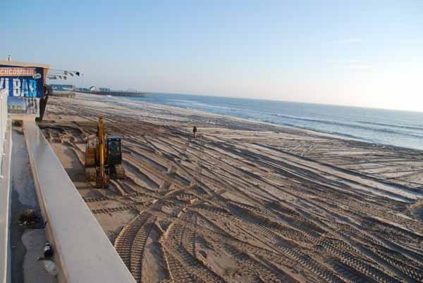 <p><p><span style="font-family: Tahoma, 'Sans Serif', Arial; font-size: small;">Seaside Heights' beach, its famous boardwalk missing since being removed after Superstorm Sandy, as seen from the deck of the Beachcomber Bar. (Sandy Levine/for NewsWorks)</span></p></p>
