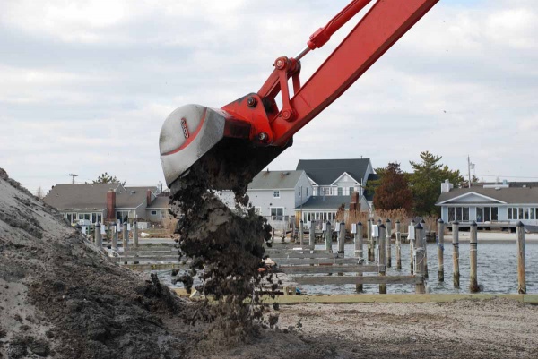 <p><p>Clearing the region's waterways of sand and debris is an ongoing battle as the Jersey Shore prepares for the summer season. (Sandy Levine/for NewsWorks)</p></p>
