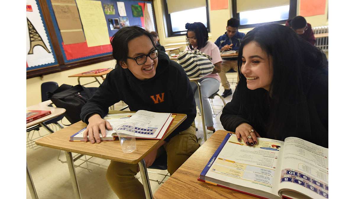 Minh Le, 16; and Janneiry Martinez, 17; in Paula Saillard's French class at Woodrow Wilson High School.