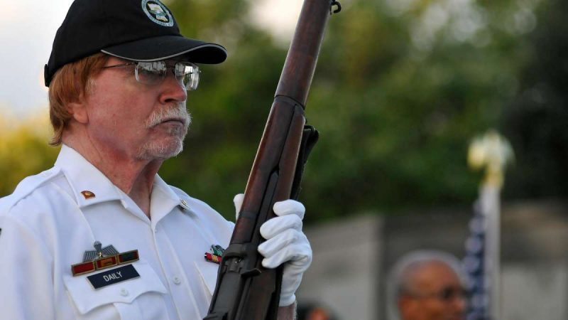 Mike Daily takes part in the ceremony at the Philadelphia Vietnam Veterans Memorial on Friday.