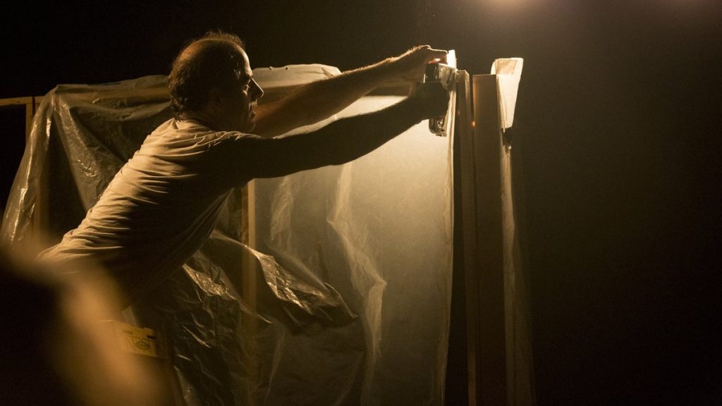 675-227 Geoff Sobelle begins to build his house in the Philly Fringe Festival production of 'Home' in 2017. (Courtesy of Maria Baranova)