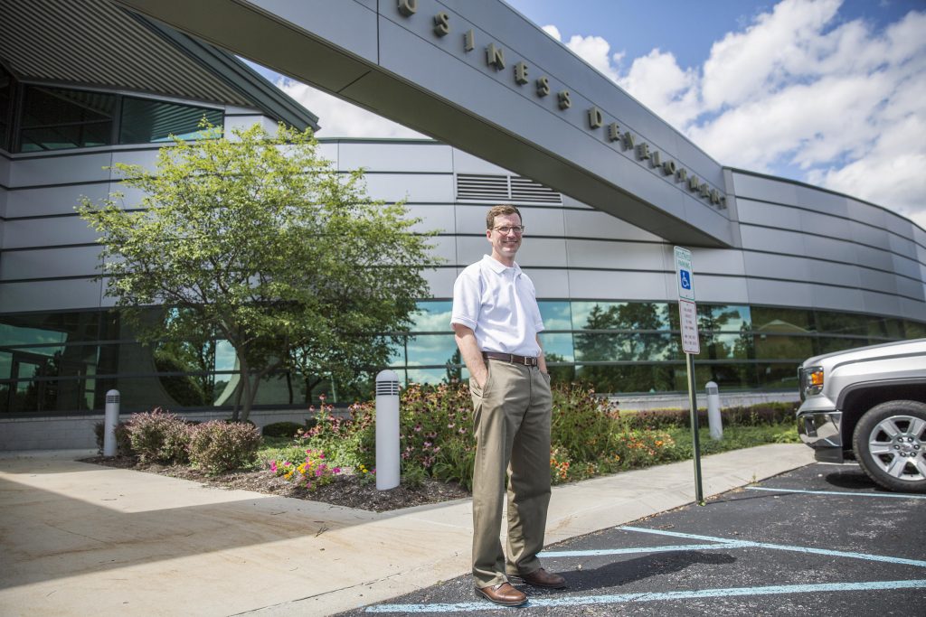 IMG_6971 Steven McKnight in front of the building that houses the Altoona Blair County Development Corp., where he's the president and CEO. He started the First Frontier campaign to bring natives and newcomers to Altoona. (MIN XIAN / WPSU)
