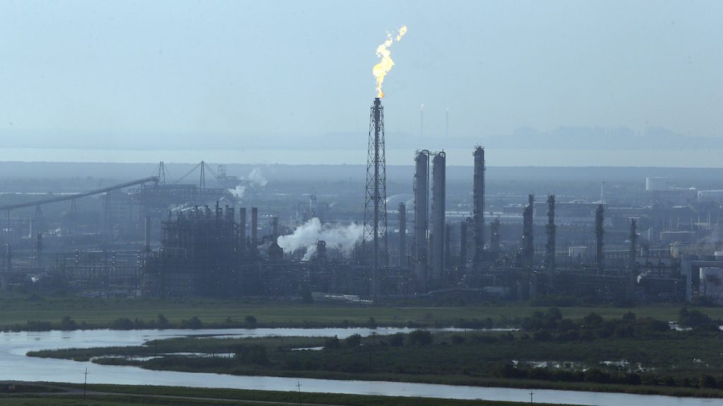 ap_17244549099811 A flare stack puts out a flame at a refinery near an area hit by floodwaters from Tropical Storm Harvey in Port Arthur, Texas, Friday, Sept. 1, 2017. (AP Photo/LM Otero)
