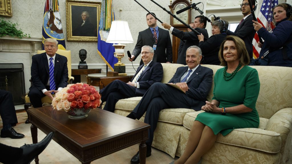 ap_17249560358621 President Donald Trump meets with, from left, Senate Majority Leader Mitch McConnell, R-Ky., Senate Minority Leader Chuck Schumer, D-N.Y., and House Minority Leader Nancy Pelosi, D-Calif., and other Congressional leaders in the Oval Office of the White House, Wednesday, Sept. 6, 2017, in Washington. (AP Photo/Evan Vucci)