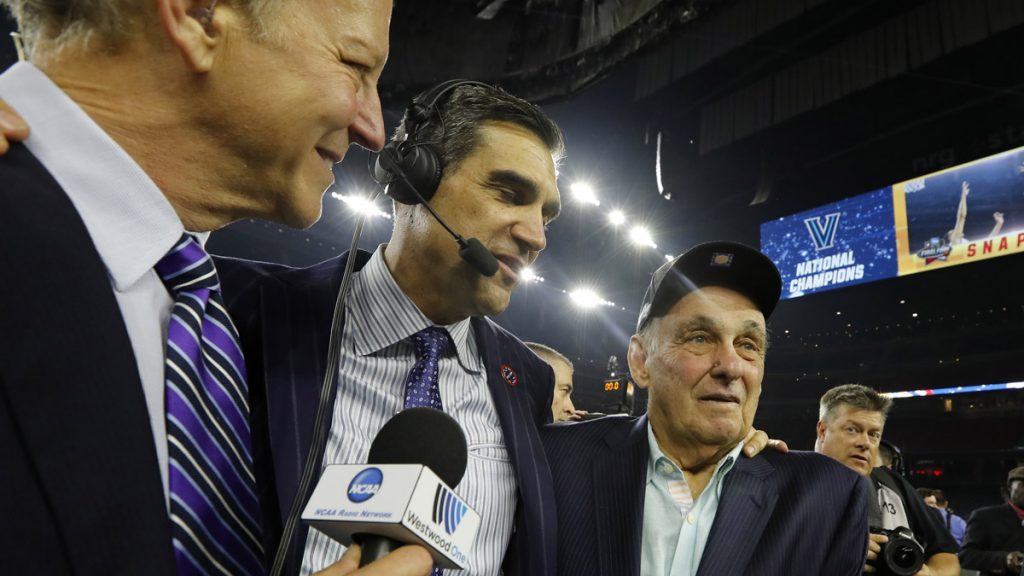 ap_54991143218 Villanova head coach Jay Wright, center, celebrates with 1985 Villanova coach Rollie Massimino, right, after the NCAA Final Four tournament college basketball championship game against North Carolina last year. Massimino, who led Villanova to the NCAA title in 1985, died Wednesday at 82. (AP Photo/David J. Phillip)