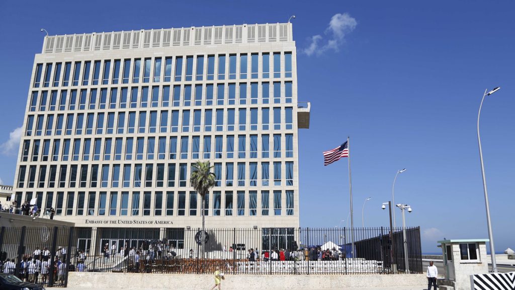 apcubamysteryx1200 In this Aug. 14, 2015, file photo, a U.S. flag flies at the U.S. embassy in Havana, Cuba. U.S. investigators are chasing many theories about what’s harming American diplomats in Cuba, including a sonic attack, electromagnetic weapon or flawed spying device. (Desmond Boylan/AP Photo, File)