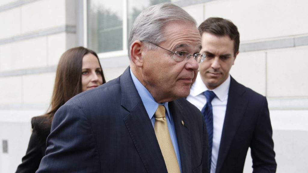 apmenendeztrialday2x1200 Sen. Bob Menendez, center, arrives at the courthouse with his children, Alicia Menendez and Robert Menendez Jr., in Newark, N.J., Wednesday, Sept. 6, 2017. (Seth Wenig/AP Photo)