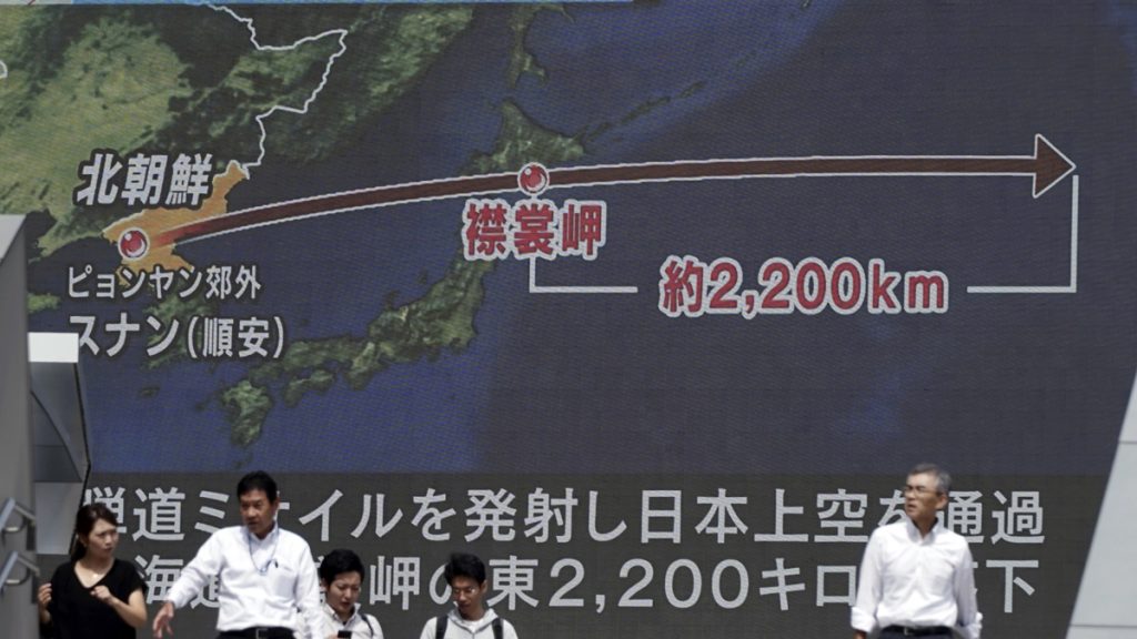 apnorthkoreax1200-1 People walk past a public TV screen broadcasting news of North Korea's launch of missile, in Tokyo, Friday, Sept. 15, 2017. North Korea launched an intermediate-range missile that flew over Japan in its longest-ever flight on Friday, showing that leader Kim Jong Un is defiantly pushing to bolster his weapons programs despite U.S.-led international pressure. (Eugene Hoshiko/AP Photo)