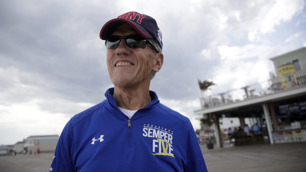apsemperfivex1200 In a photo taken Thursday, Sept. 14, 2017, Frank Costello, organizer of the Semper Five charity run in Seaside Heights, N.J., poses for The Associated Press at the site of the start and finish lines for the race. (Julio Cortez/AP Photo)