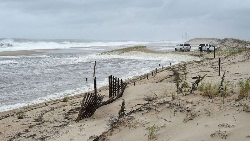 Dune breach floods Delaware highway