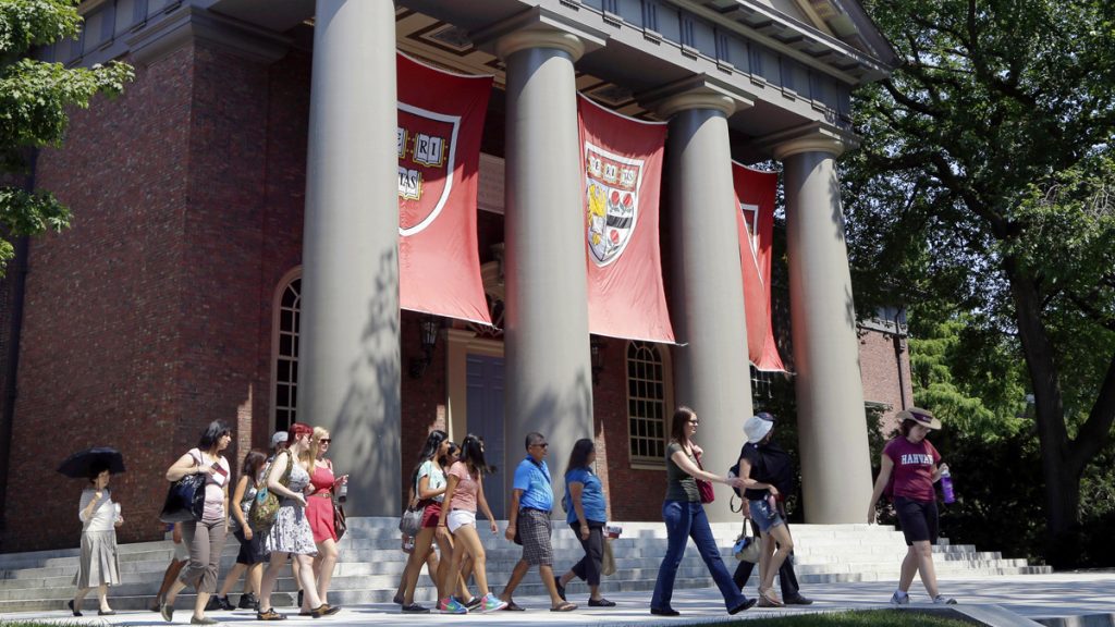 harvard-admissions_1200x675 A tour group is shown walking through the campus of Harvard University in Cambridge, Mass. Word of an August 2017 Justice Department inquiry into how race factors into admissions at Harvard University has left top-tier colleges bracing for scrutiny of practices that have boosted diversity levels to new highs. (AP Photo/Elise Amendola, File)