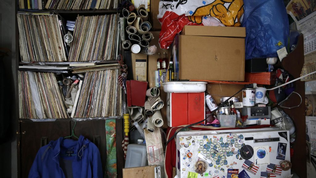 hoarder_1200x675 Part of a cluttered New York City apartment is shown in this photo from 2016. (AP Photo/Seth Wenig, file)